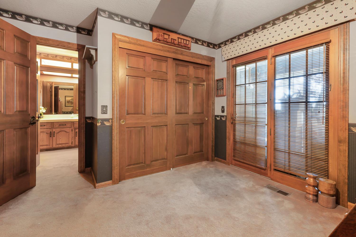 22050 Buena Vista Road Clements, CA 95227 - Photo 37 of 61 Sunroom Can be Accessed Through these Double Doors