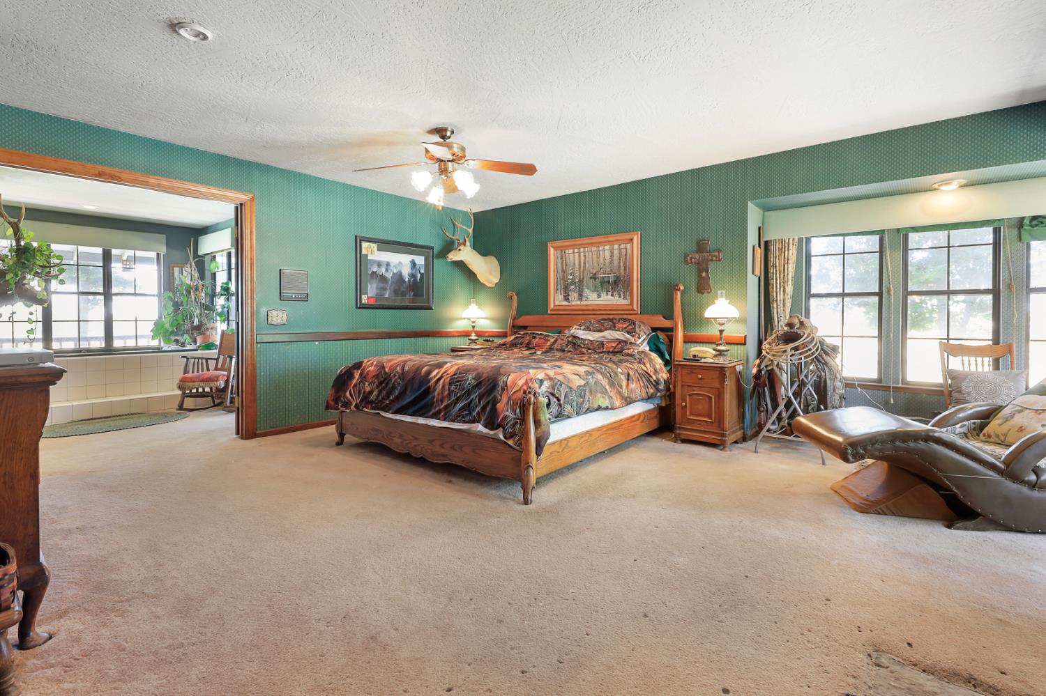 22050 Buena Vista Road Clements, CA 95227 - Photo 42 of 61 a living room with furniture and a chandelier