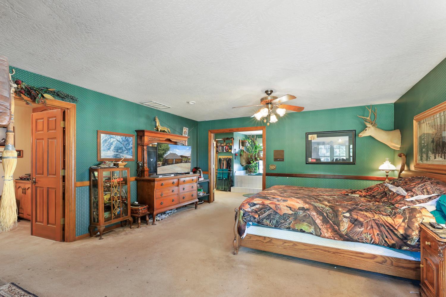 22050 Buena Vista Road Clements, CA 95227 - Photo 43 of 61 a bedroom with bed and window