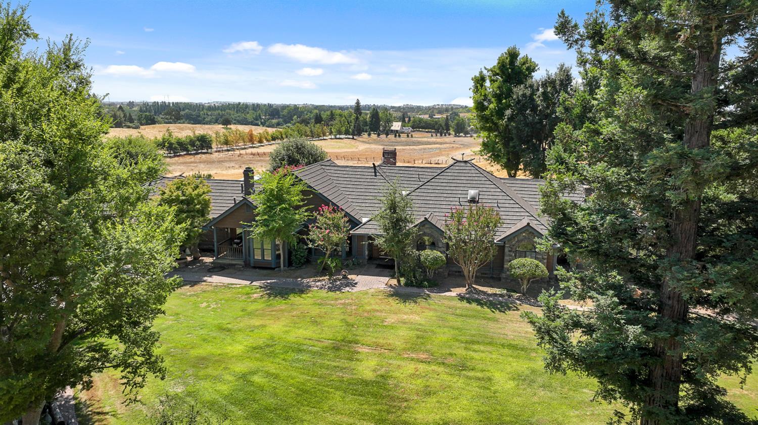 22050 Buena Vista Road Clements, CA 95227 - Photo 51 of 61 a view of a lake with a house