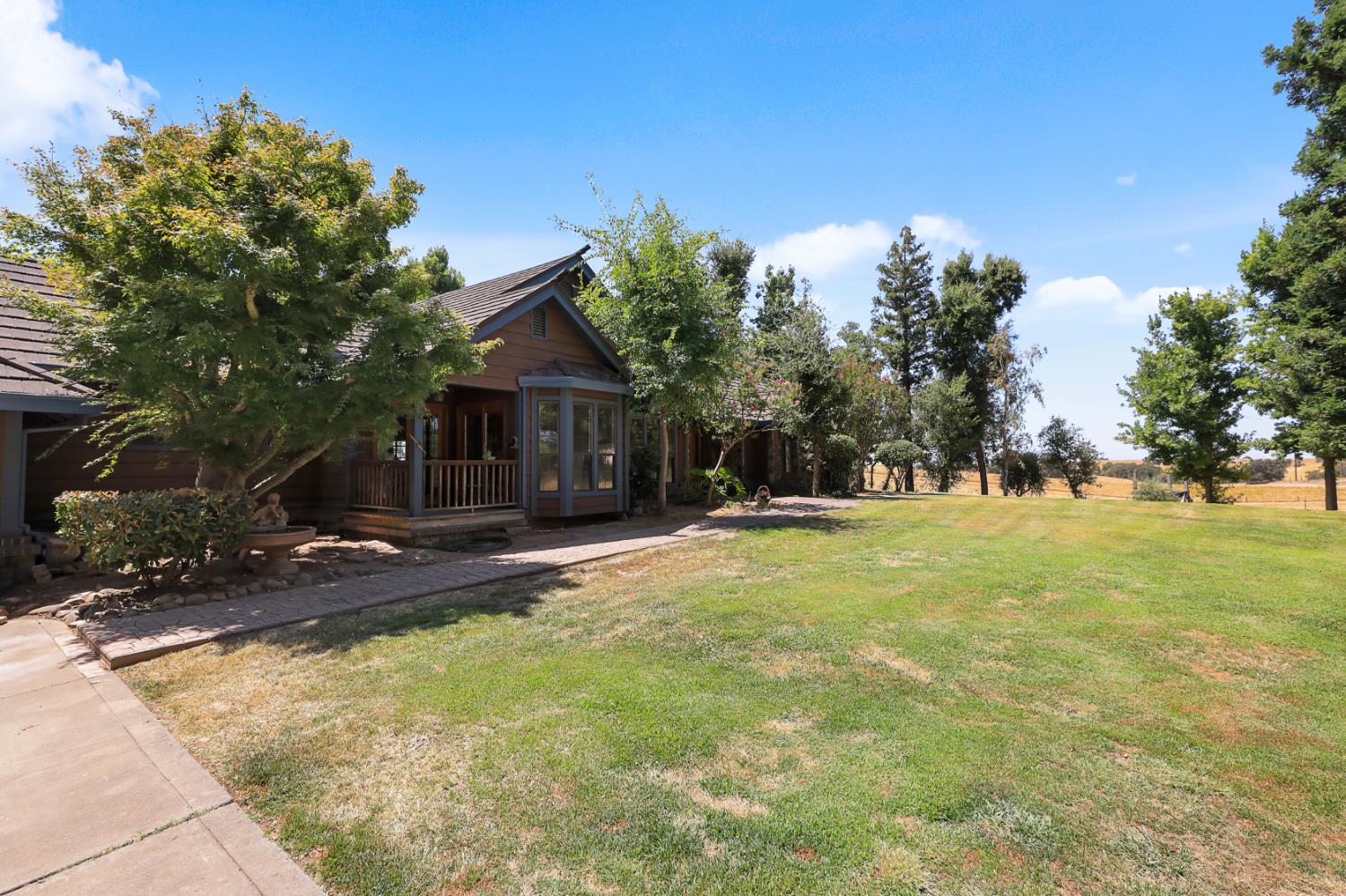 22050 Buena Vista Road Clements, CA 95227 - Photo 54 of 61 a view of a house with a yard and tree s