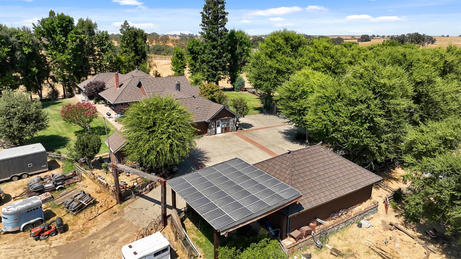 22050 Buena Vista Road Clements, CA 95227 - Photo 55 of 61 an aerial view of a house with balcony and trees al around
