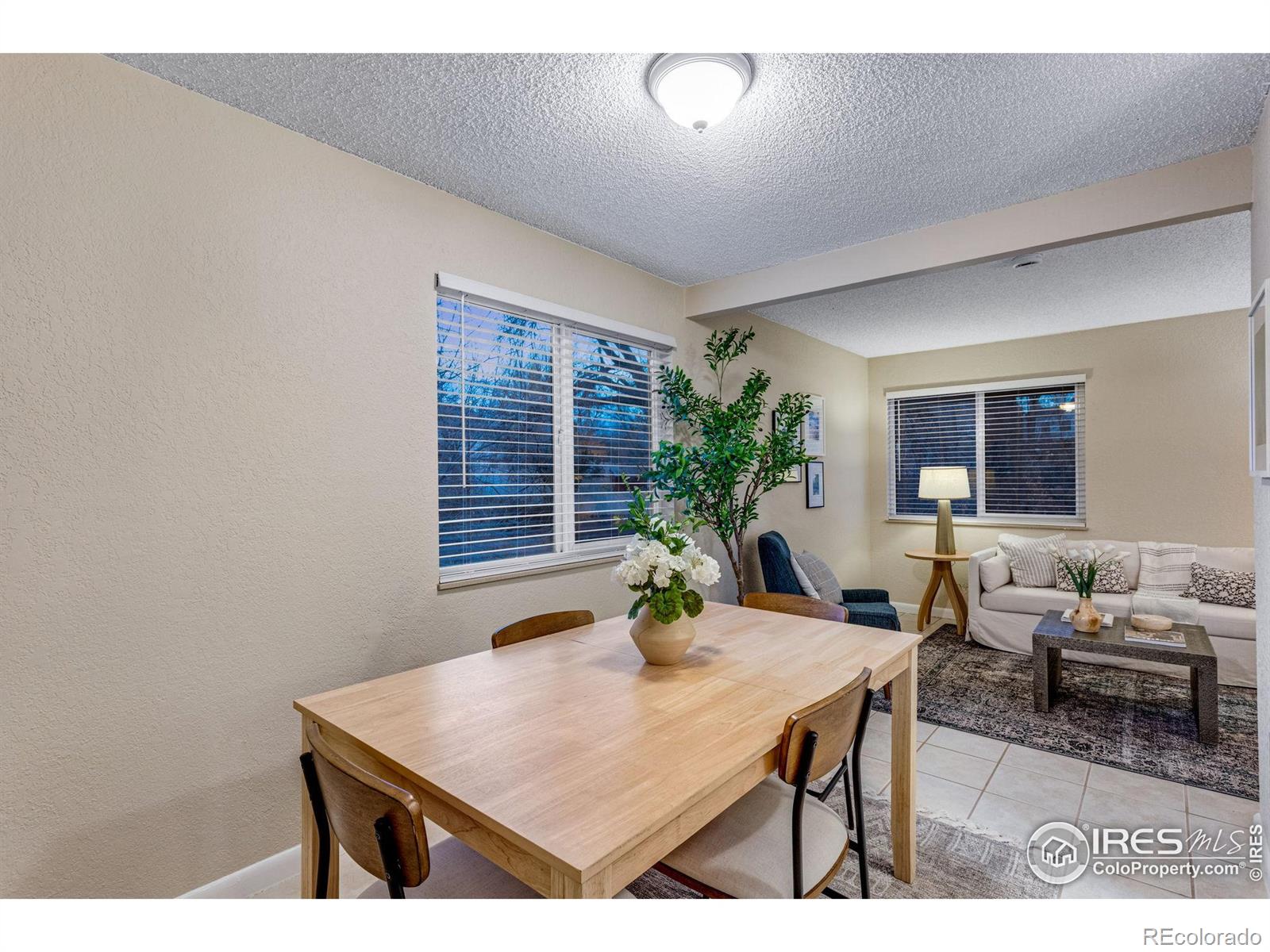 1705 Heatheridge Road Fort Collins, CO 80526 - Photo 11 of 21 a view of a livingroom with furniture and window