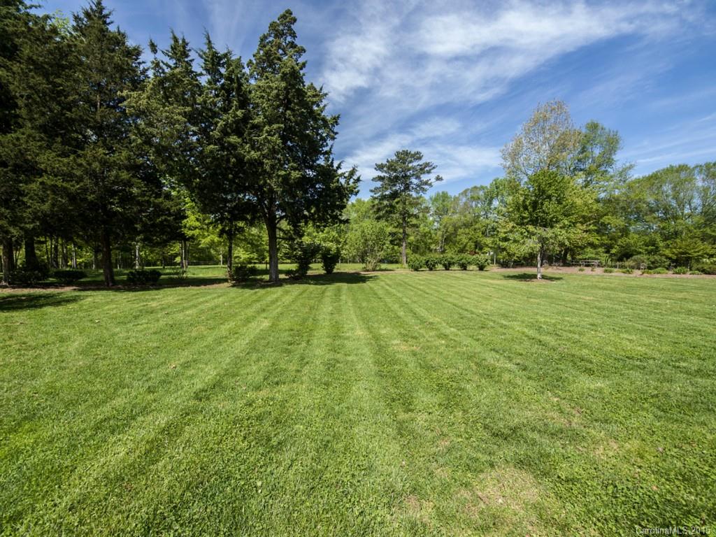 5029 Mobley Store Road McConnells, SC 29726 - Photo 15 of 24 a view of a grassy field with trees