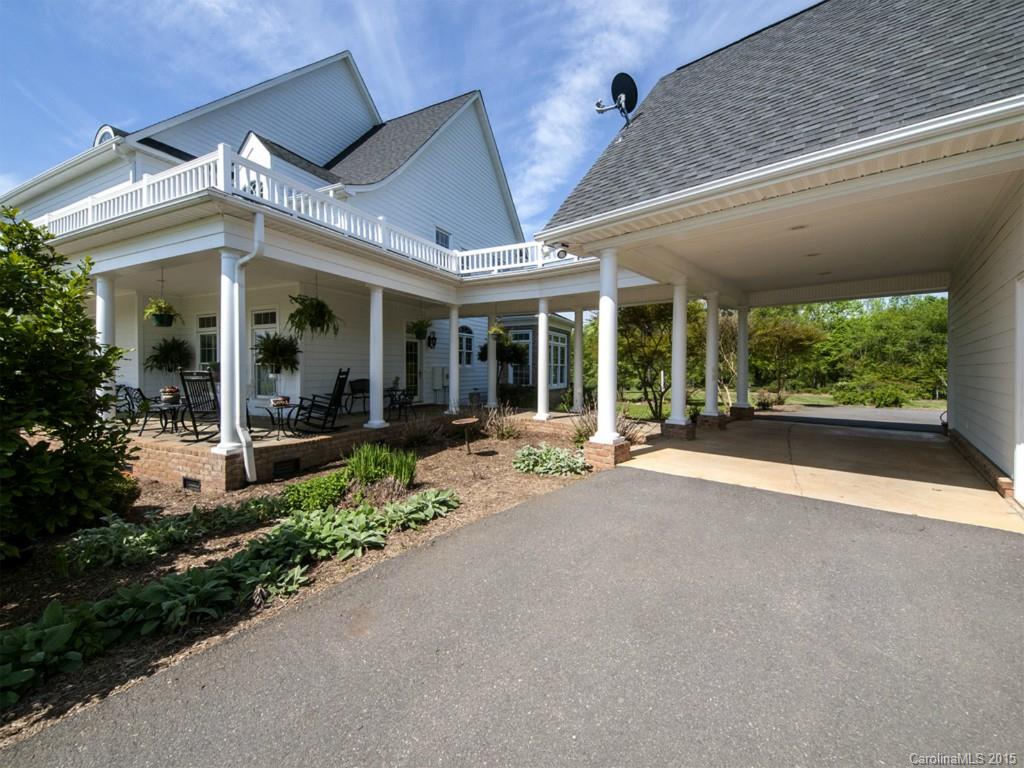5029 Mobley Store Road McConnells, SC 29726 - Photo 16 of 24 a view of a building with porch and garden