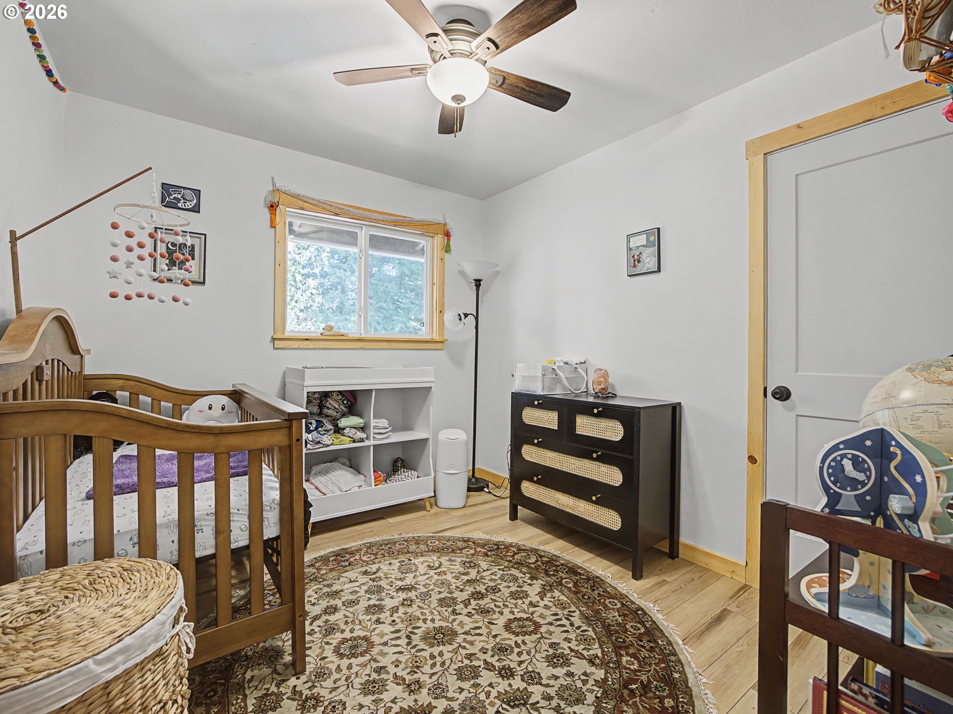 36036 Southeast Gunderson Road Sandy, OR 97055 - Photo 19 of 48 a bedroom with furniture and a window