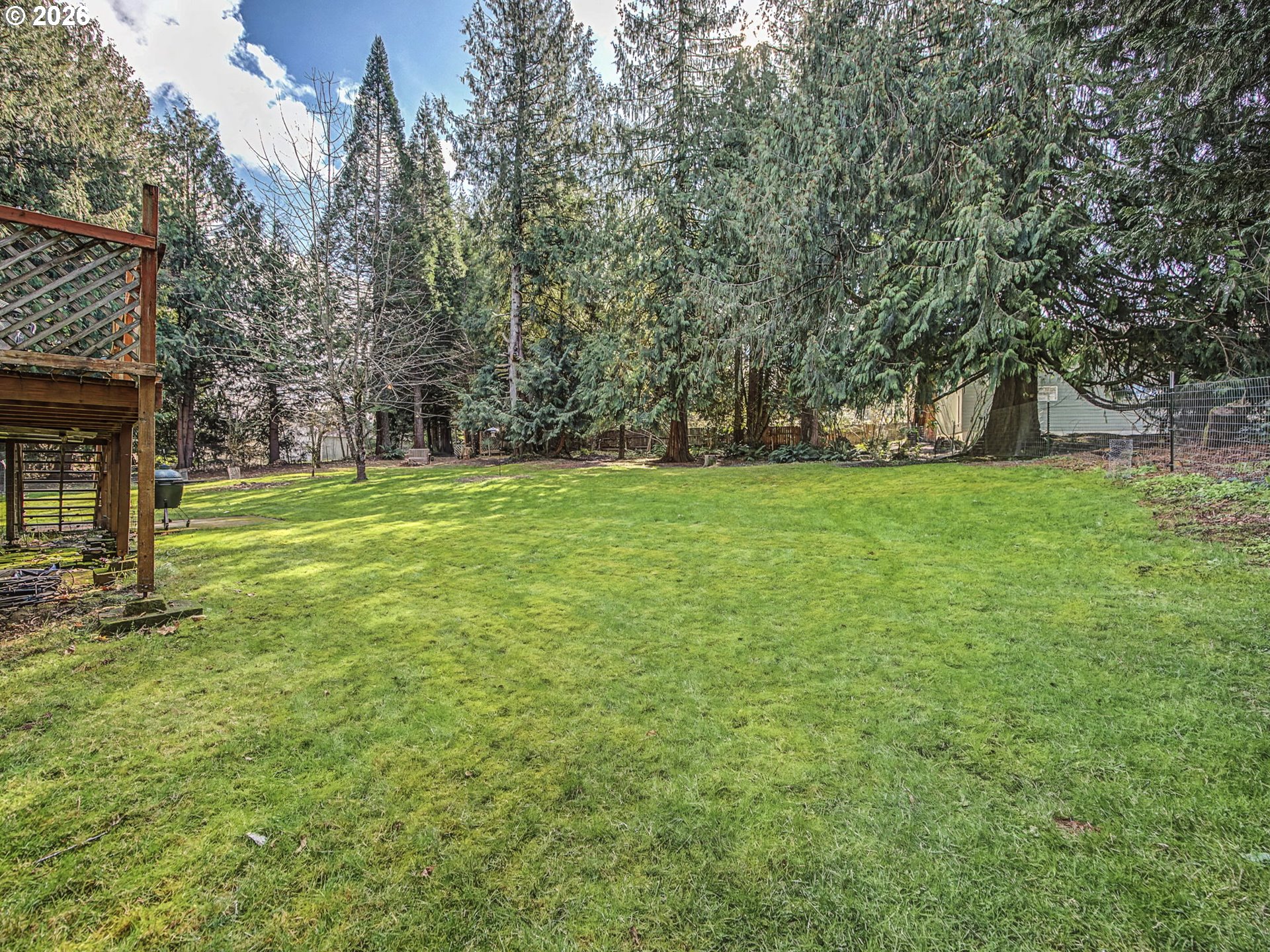 36036 Southeast Gunderson Road Sandy, OR 97055 - Photo 39 of 48 a backyard of a house with lots of green space
