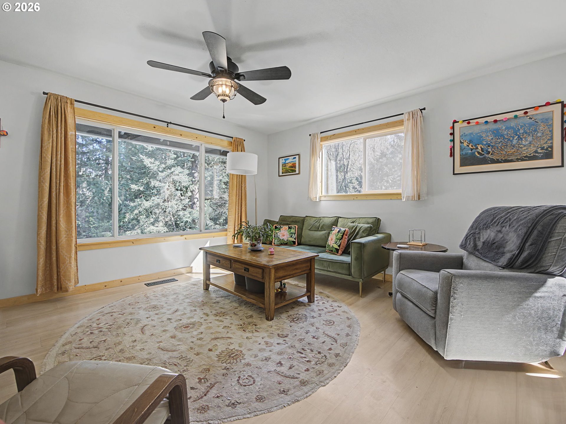 36036 Southeast Gunderson Road Sandy, OR 97055 - Photo 4 of 48 a living room with furniture and a large window