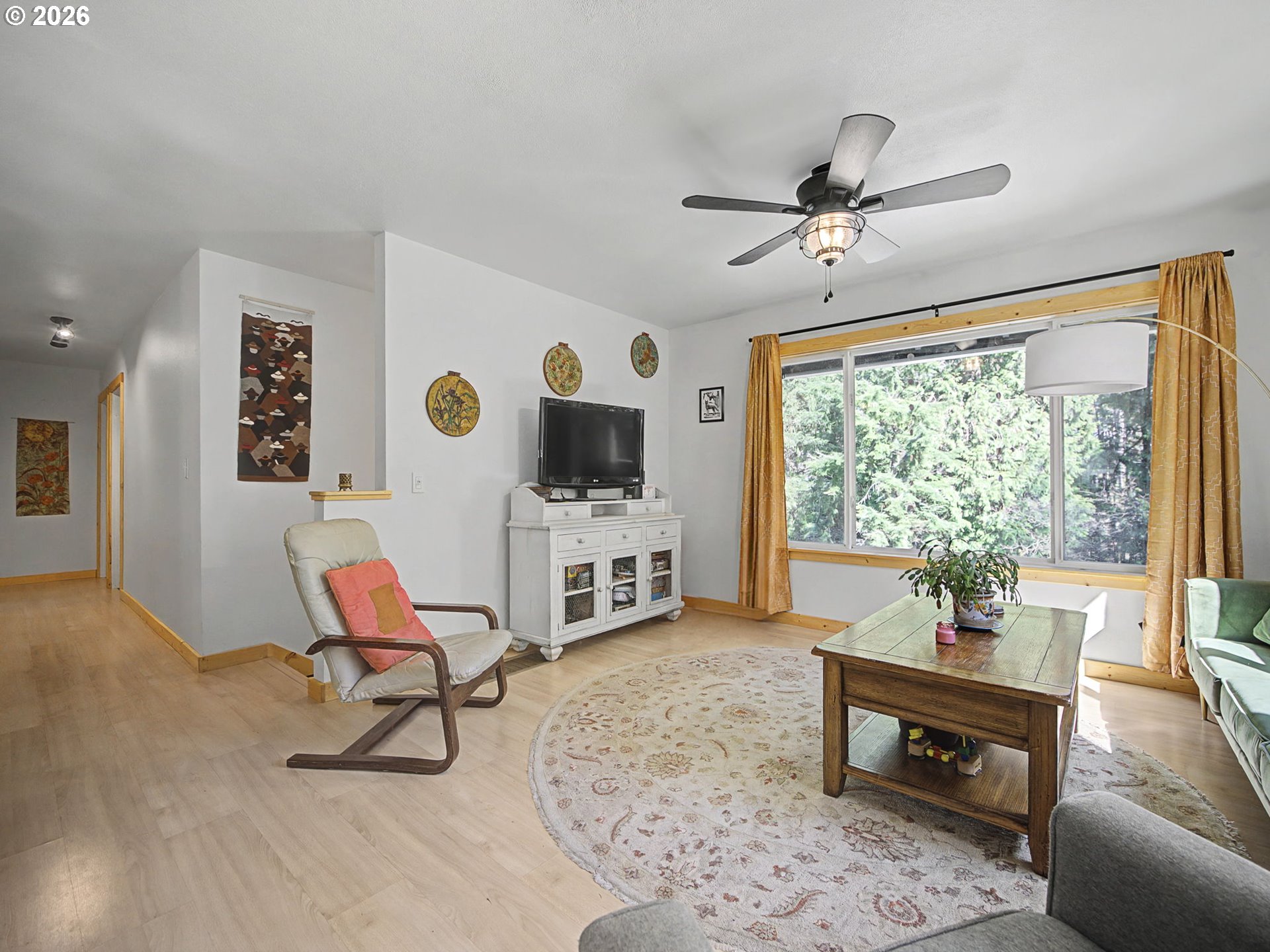 36036 Southeast Gunderson Road Sandy, OR 97055 - Photo 5 of 48 a living room with furniture and a window