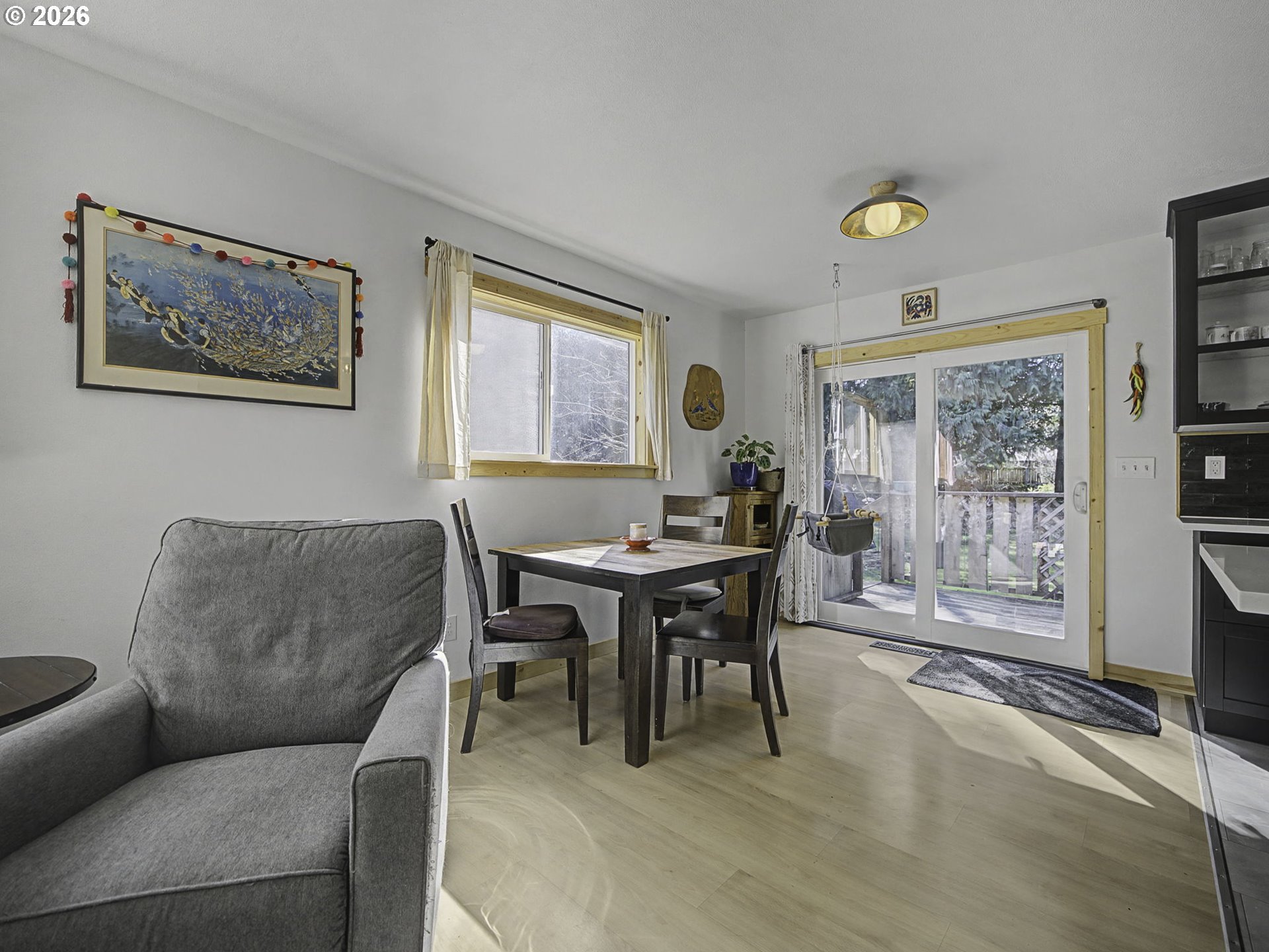 36036 Southeast Gunderson Road Sandy, OR 97055 - Photo 8 of 48 a living room with furniture a table and a large window