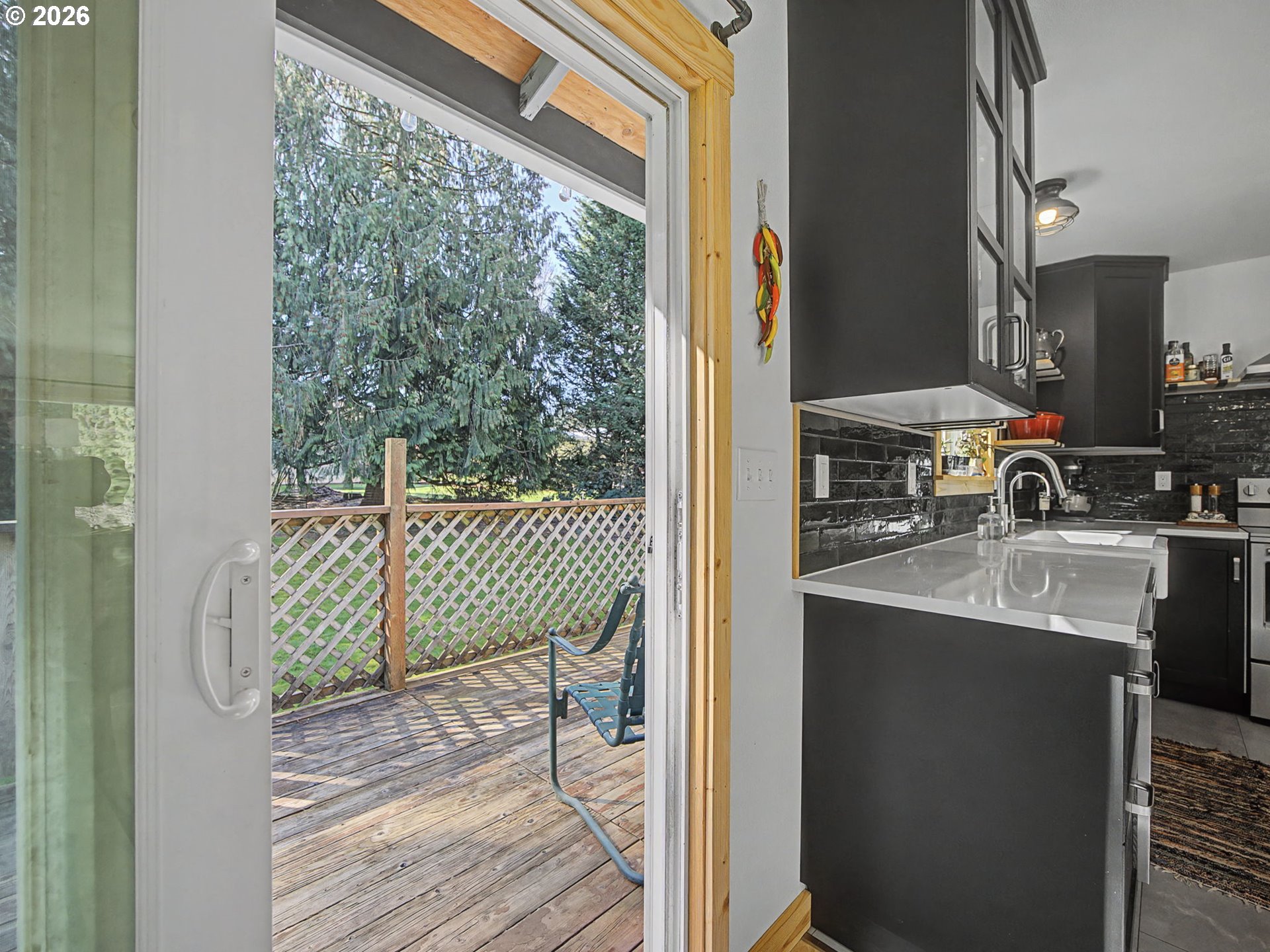 36036 Southeast Gunderson Road Sandy, OR 97055 - Photo 9 of 48 a kitchen with a sink and a refrigerator