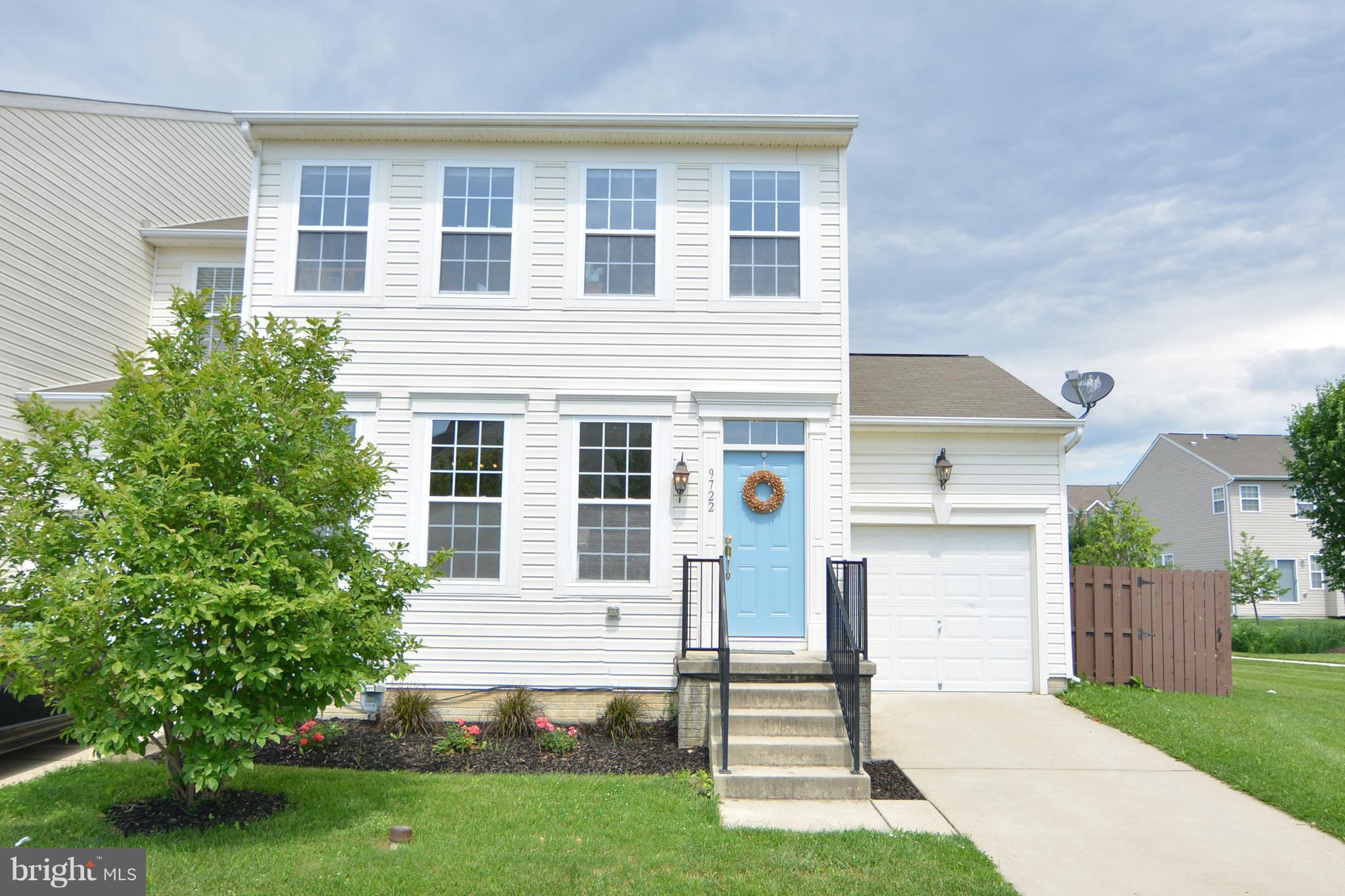 9722 Langley Road Baltimore, MD 21220 - Photo 1 of 30 a view of a house with a yard and a garden