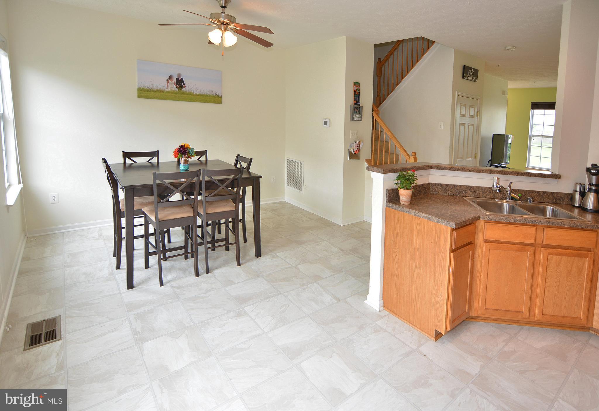 9722 Langley Road Baltimore, MD 21220 - Photo 27 of 30 a view of a dining room kitchen and a window
