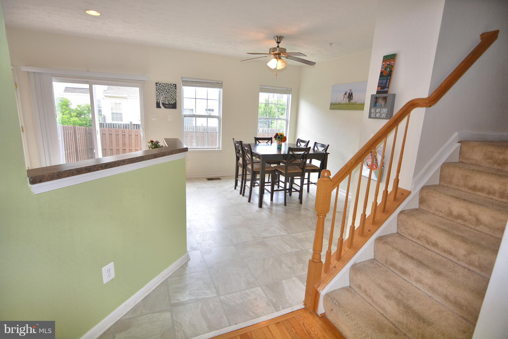 9722 Langley Road Baltimore, MD 21220 - Photo 5 of 30 a view of a livingroom with furniture and hardwood floor