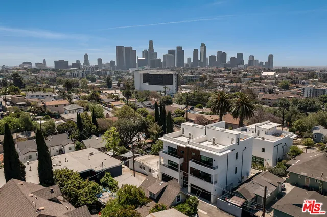 an aerial view of a city with lots of residential buildings