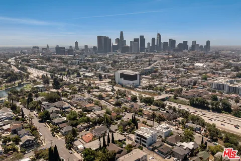 an aerial view of a city with lots of residential buildings