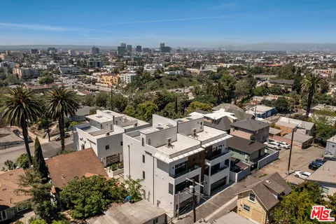 an aerial view of a city with lots of residential buildings