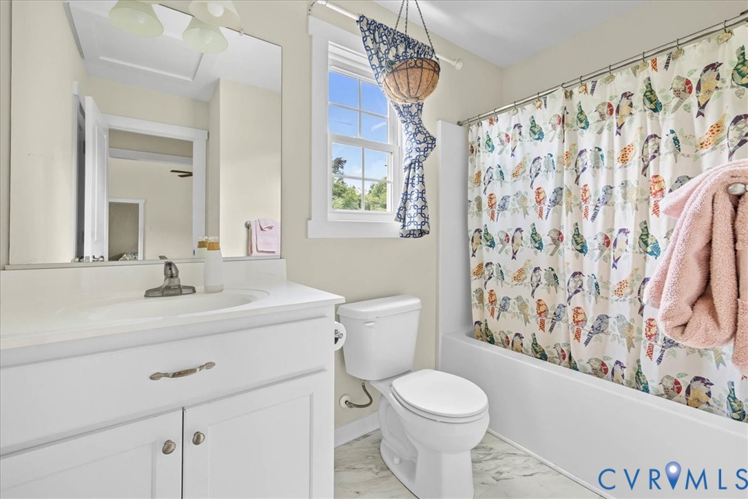 7341 Thweatt Drive Disputanta, VA 23842 - Photo 21 of 38 a bathroom with a sink toilet and shower