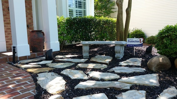 5435 Brandy Bay Road Raleigh, NC 27613 - Photo 18 of 25 Custom landscaping, square columns, flat rock, outdoor uplights, custom front walkway, Front Exterior