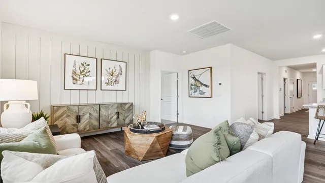 a living room with furniture and a couch