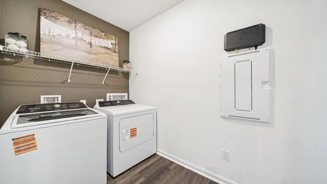 a utility room with dryer and washer