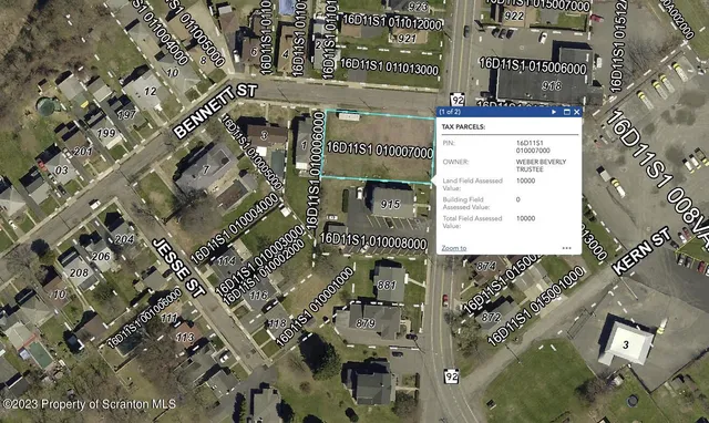 an aerial view of multi story residential apartment building