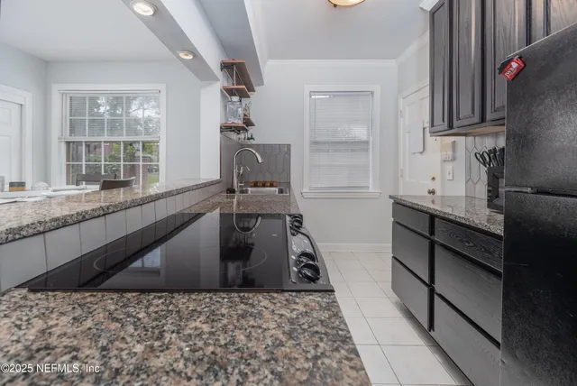 a view of kitchen and sink
