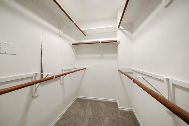 a view of a hallway with stairs