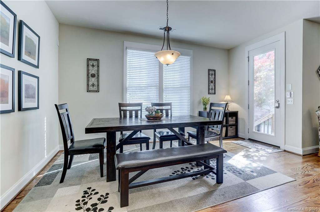 3422 Richard's Crossing Fort Mill, SC 29708 - Photo 18 of 48 a view of a dining room with furniture window and wooden floor