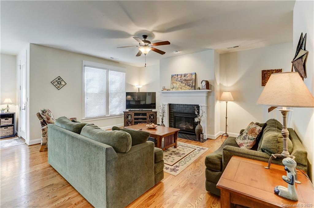3422 Richard's Crossing Fort Mill, SC 29708 - Photo 21 of 48 a living room with furniture and a fireplace