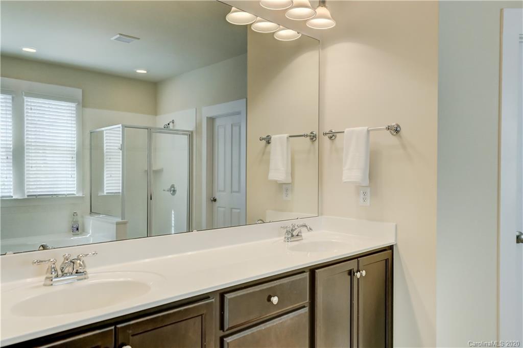 3422 Richard's Crossing Fort Mill, SC 29708 - Photo 27 of 48 a bathroom with a sink double vanity and a mirror
