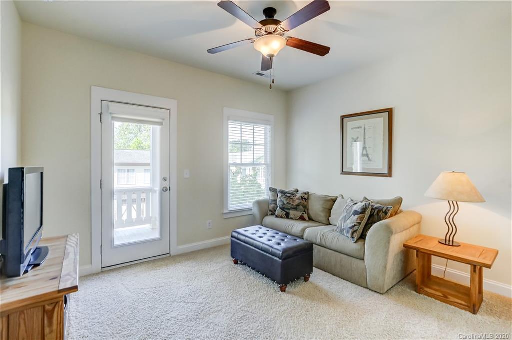 3422 Richard's Crossing Fort Mill, SC 29708 - Photo 32 of 48 a living room with furniture a flat screen tv and a window