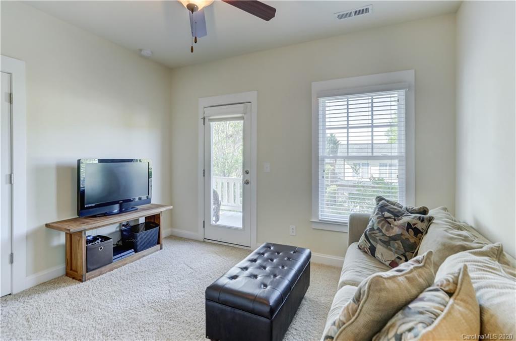 3422 Richard's Crossing Fort Mill, SC 29708 - Photo 33 of 48 a living room with furniture and a flat screen tv