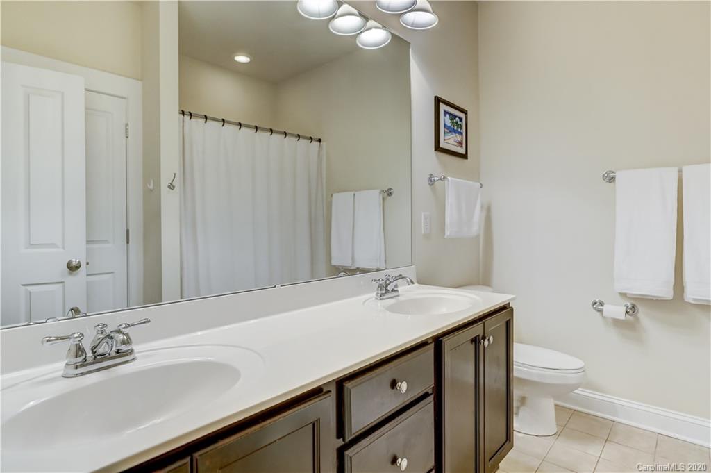 3422 Richard's Crossing Fort Mill, SC 29708 - Photo 36 of 48 a bathroom with a sink and a mirror