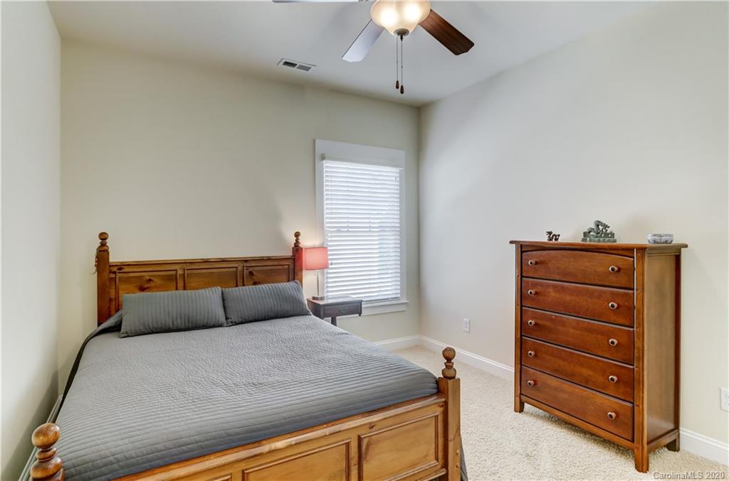 3422 Richard's Crossing Fort Mill, SC 29708 - Photo 37 of 48 a bedroom with a bed and a ceiling fan