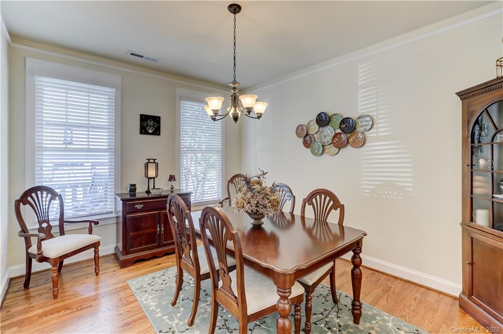 3422 Richard's Crossing Fort Mill, SC 29708 - Photo 7 of 48 a view of a dining room with furniture and chandelier