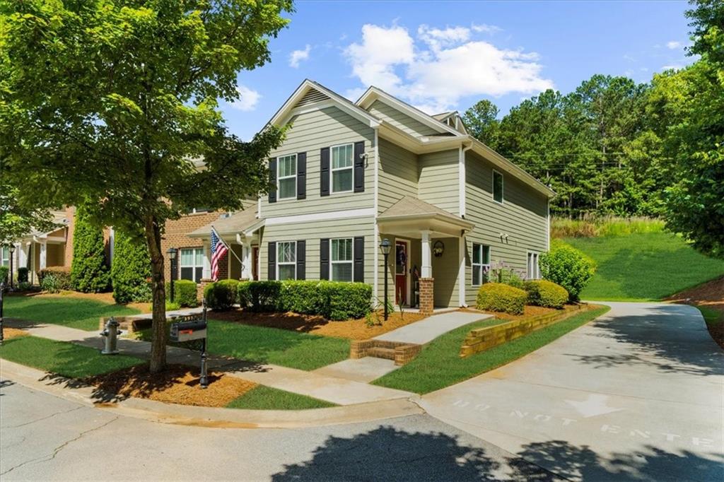 397 Cypher Drive Suwanee, GA 30024 - Photo 1 of 1 a front view of a house with a yard
