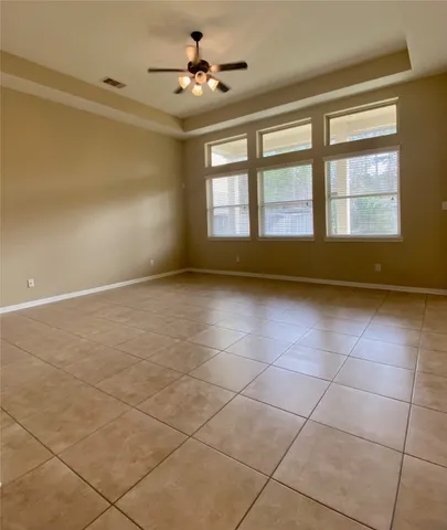 a view of a kitchen with a sink and cabinets