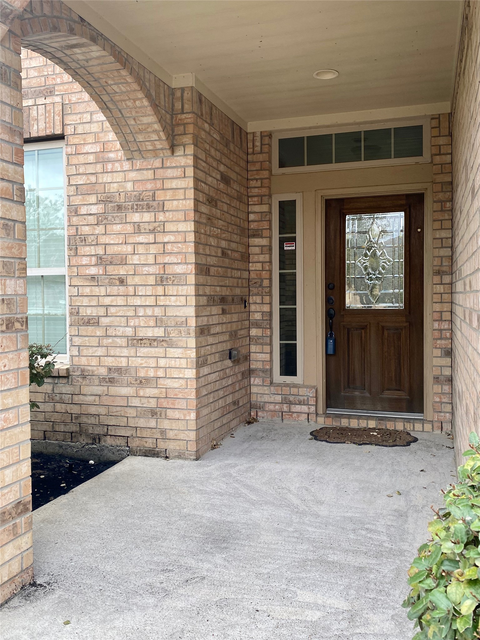 15 Sagamore Ridge Place The Woodlands, TX 77389 - Photo 2 of 39 a view of wooden door and outdoor space