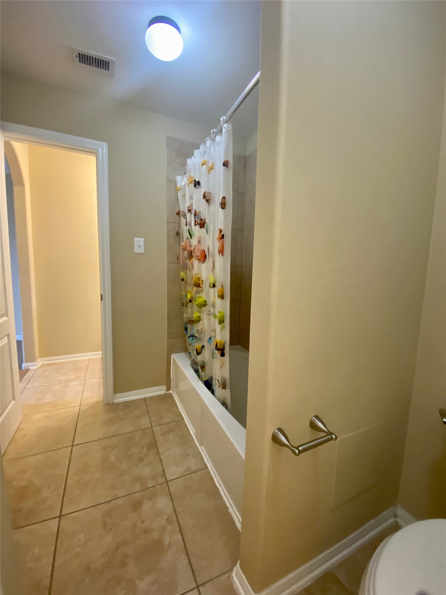 15 Sagamore Ridge Place The Woodlands, TX 77389 - Photo 35 of 39 a bathroom with a toilet and shower