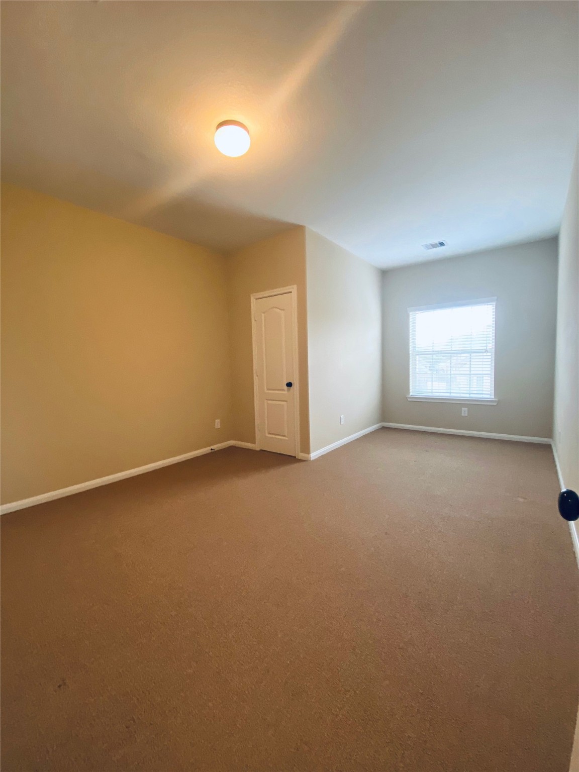 15 Sagamore Ridge Place The Woodlands, TX 77389 - Photo 36 of 39 an empty room with a window