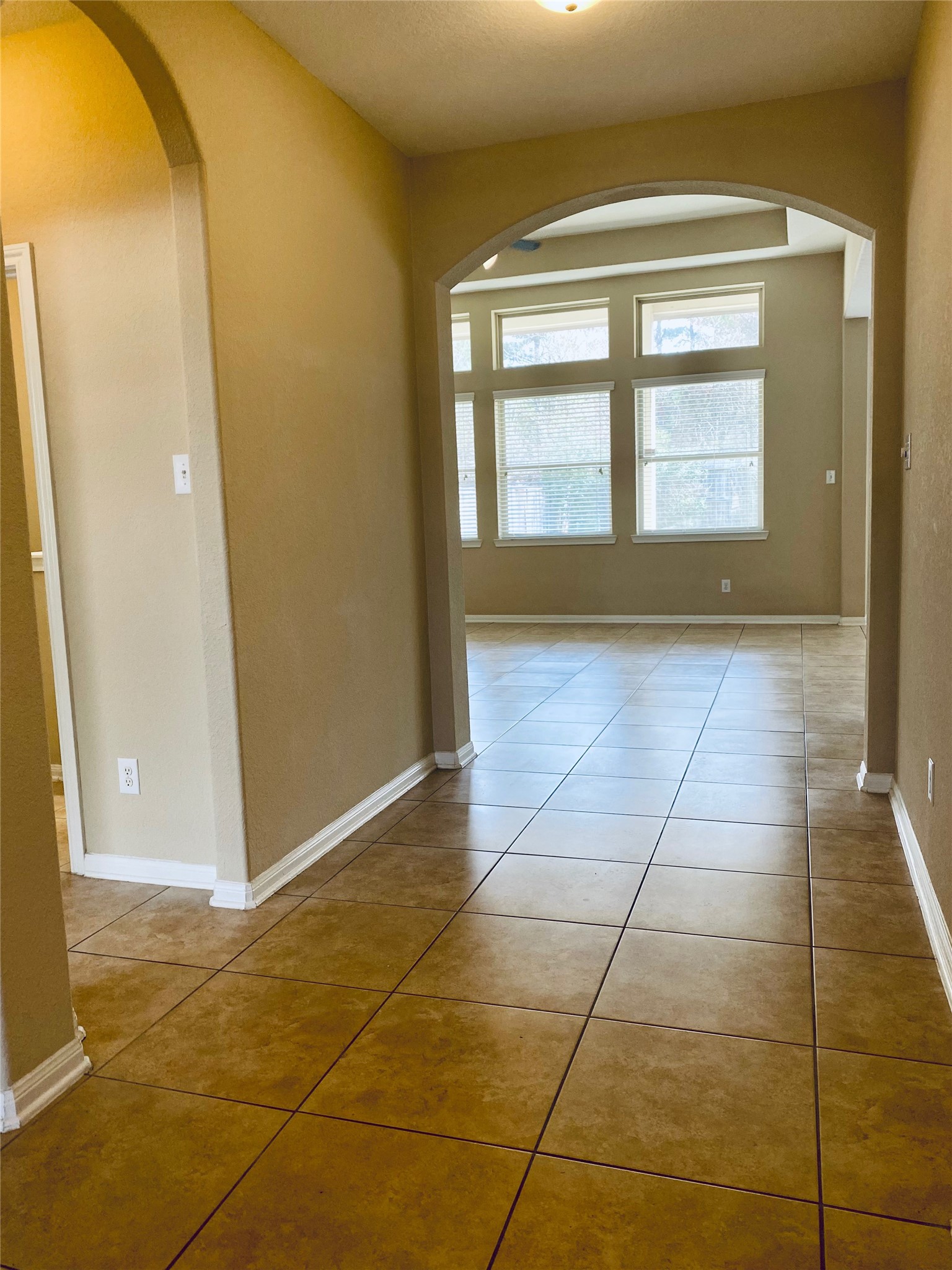 15 Sagamore Ridge Place The Woodlands, TX 77389 - Photo 8 of 39 a view of an empty room and window