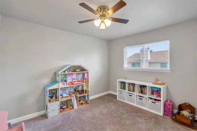 a view of a livingroom with a bookshelf