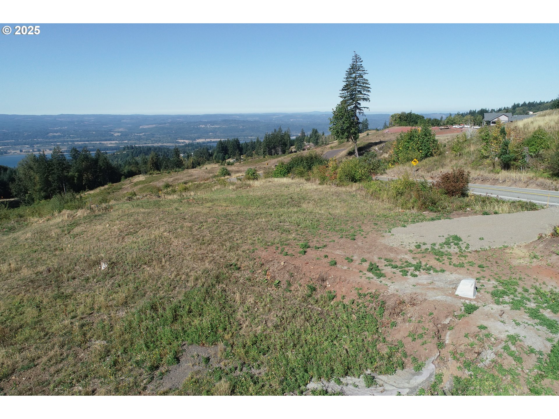 4130 Green Mountain Road, Unit 1 Kalama, WA 98625 - Photo 8 of 13 a view of a dry yard with trees