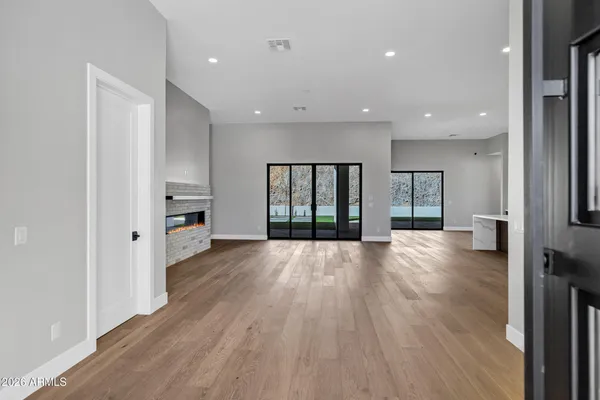 a view of kitchen with sink and microwave