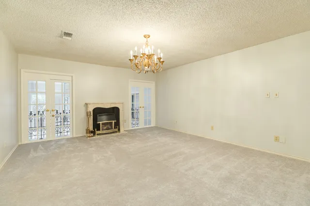 a view of a livingroom with a fireplace