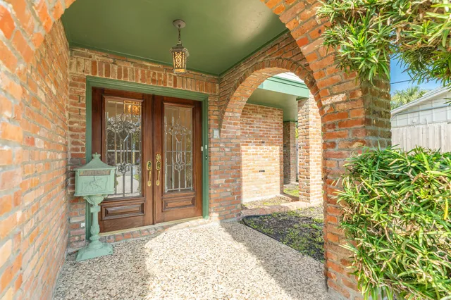 a view of a door with a porch