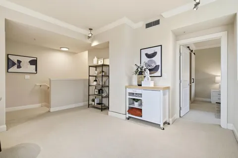 wooden floor and white walls