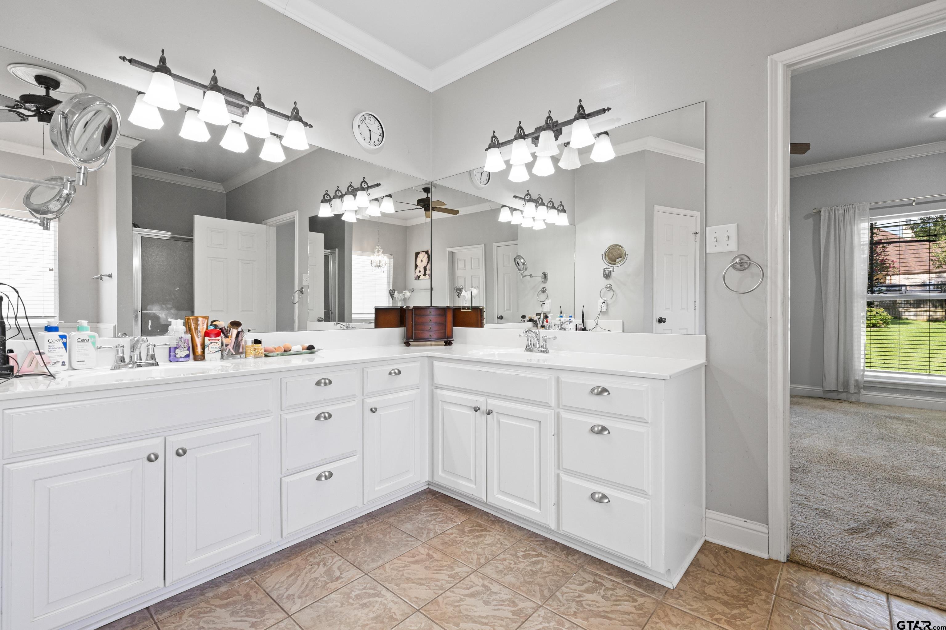 5201 Whitaker Circle Longview, TX 75605 - Photo 15 of 40 a spacious bathroom with a double vanity sink mirror and