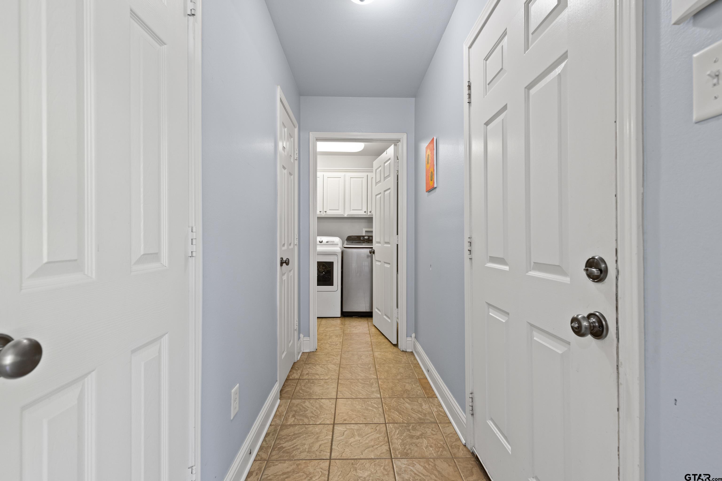 5201 Whitaker Circle Longview, TX 75605 - Photo 20 of 40 a view of a bathroom from a hallway